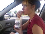 Lacy displays her adoption of the milkshake and cheesburger diet...with fries.
